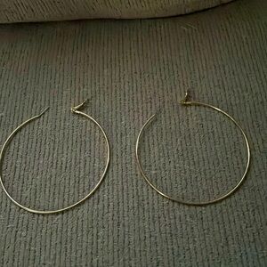 Gold colored large hoop earrings